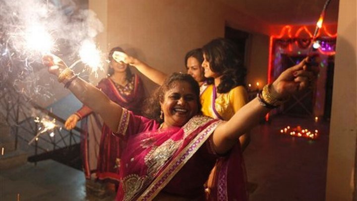 Women-celebrating-Diwali-with-fireworks-in-India