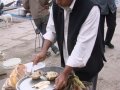 Varanasi-street-food---man-selling-breakfast-at-Dasaswamedh-Ghat
